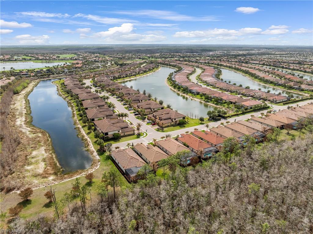 Aerial view of residential area with a nearby body of water