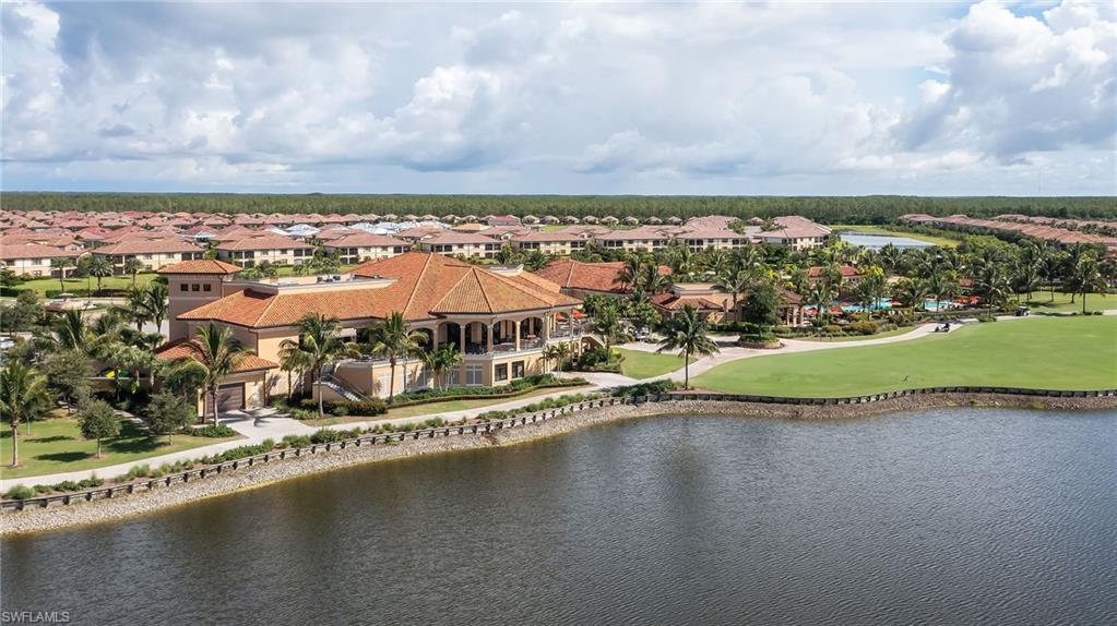 Aerial view of residential area with a large body of water