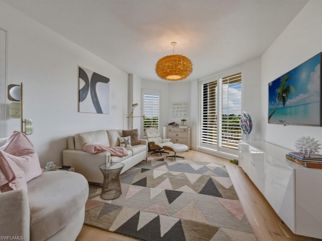 Bedroom currently used as a Den featuring light wood-flooring