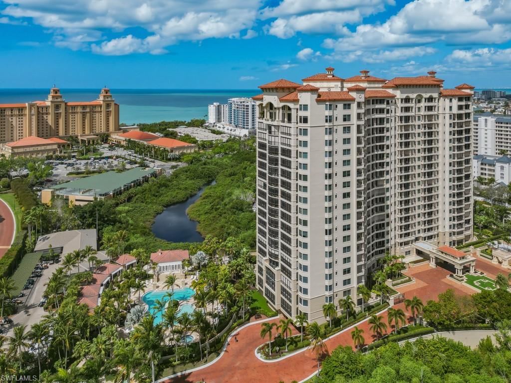 Drone / aerial view of Bay Colony / building and Gulf