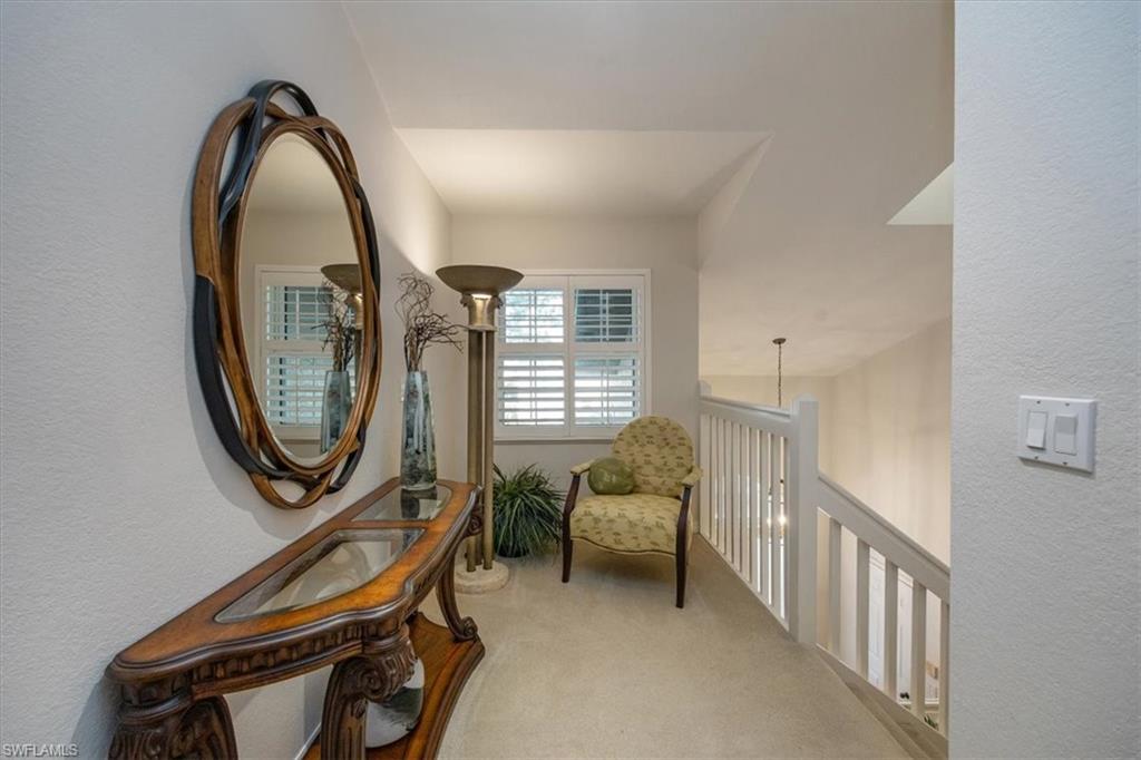 Quiet sitting lounge area top of stairs
