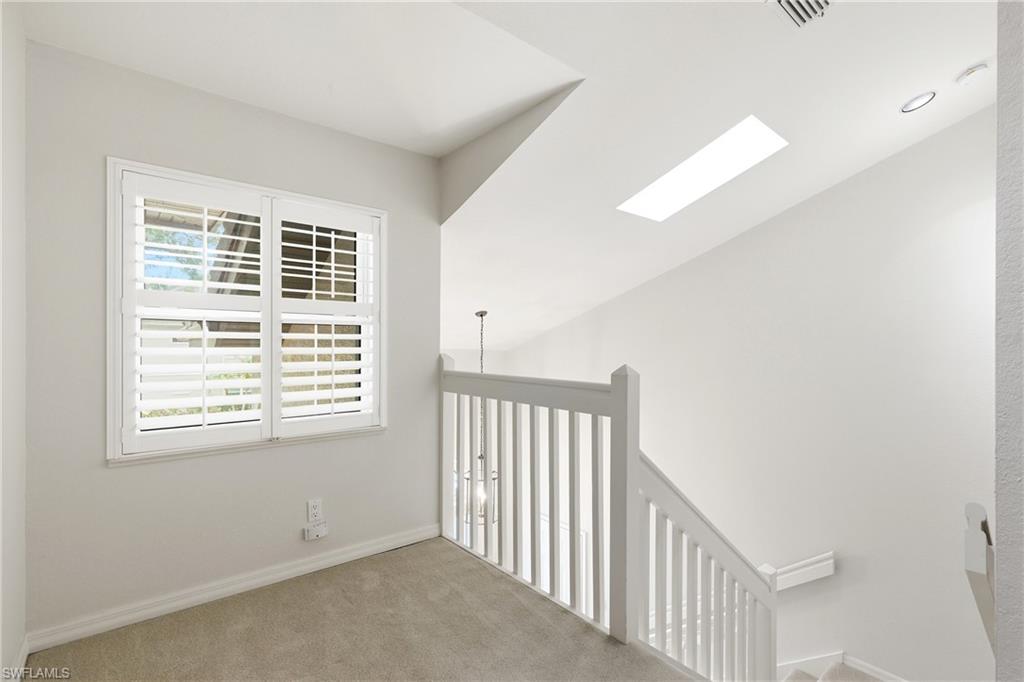 Quiet sitting area top of stairs.