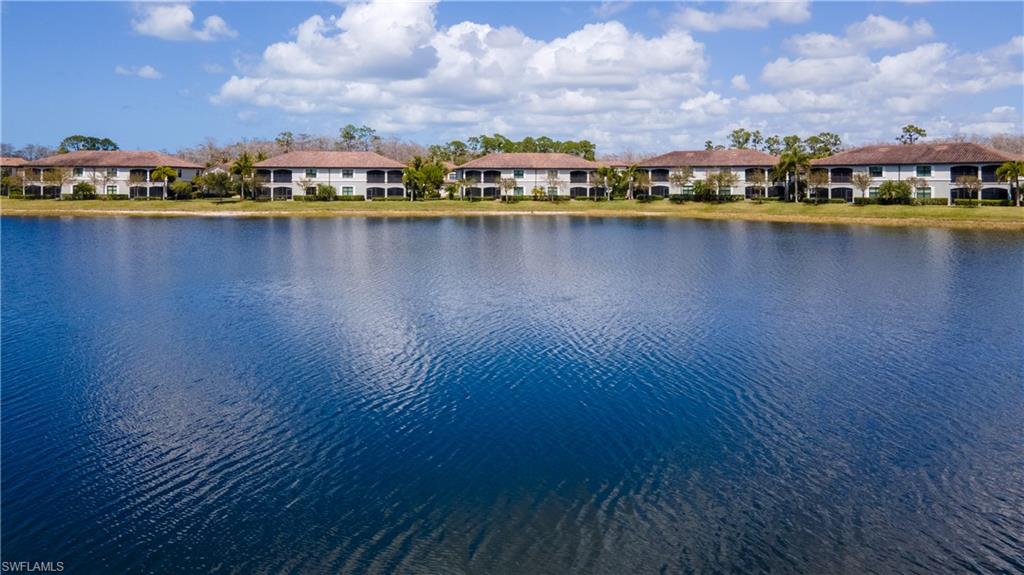 Water view featuring nearby suburban area