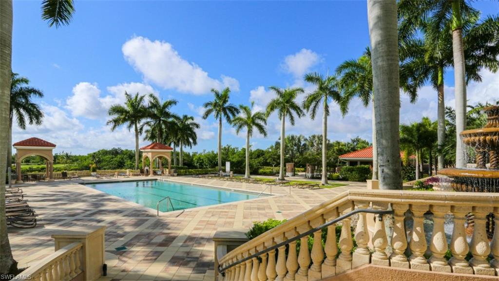 Community pool with a gazebo and a patio area