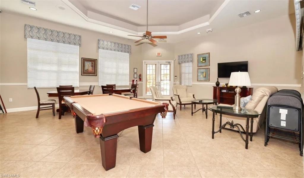 Recreation room with french doors, billiards, a tray ceiling, a ceiling fan, and recessed lighting