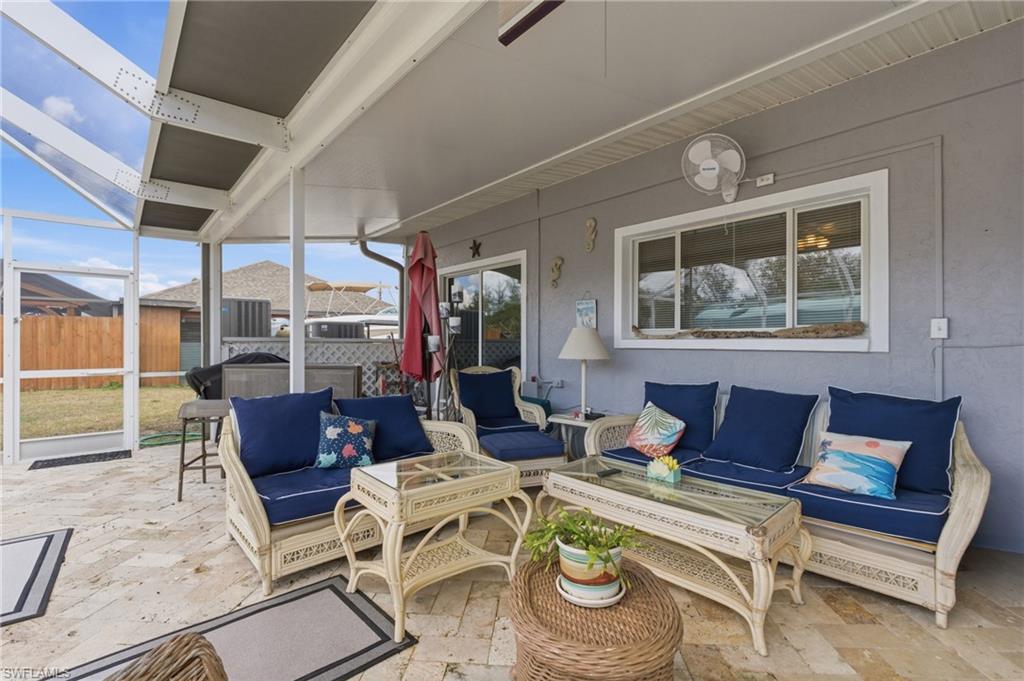View of patio with an outdoor living space