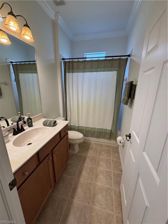 Bathroom featuring vanity, ornamental molding, shower / tub combo with curtain, and light tile patterned floors