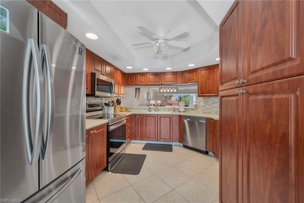 Kitchen featuring stainless steel appliances, recessed lighting