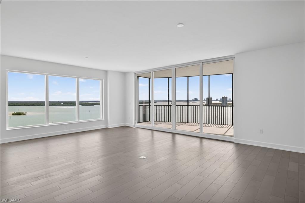 Lots of natural lighting from the floor to ceiling windows and sliders with endless water views