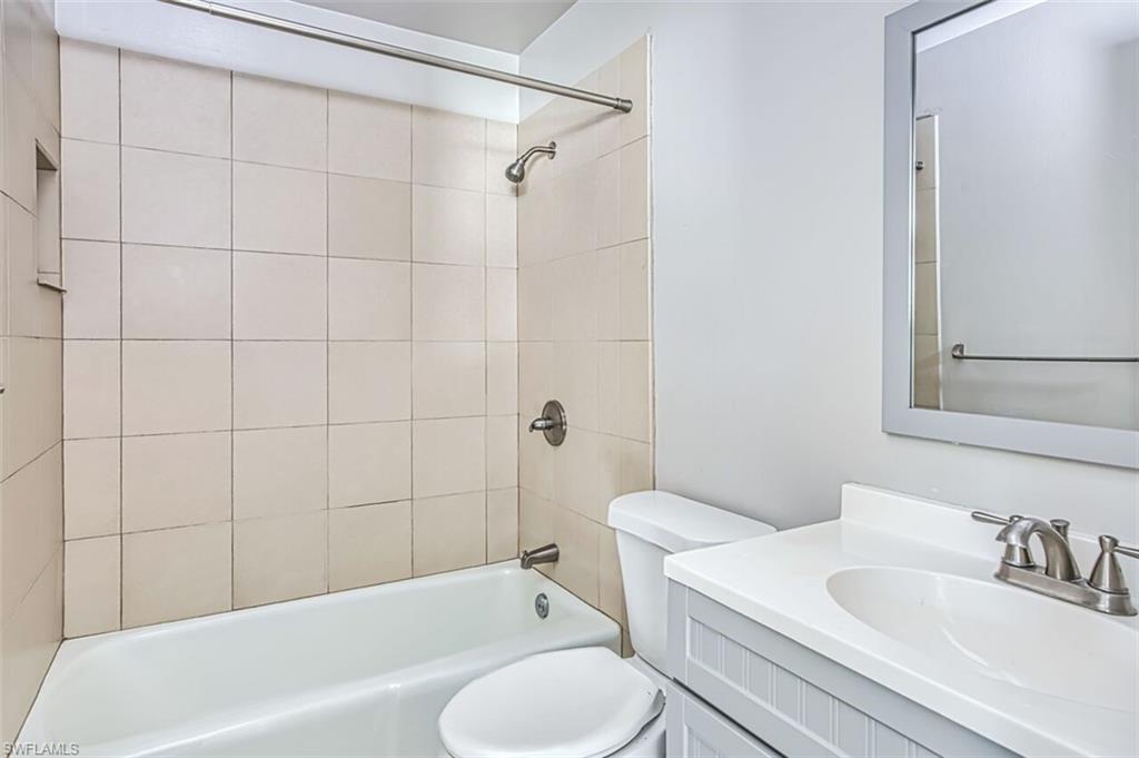 Full bathroom featuring vanity and tub / shower combination