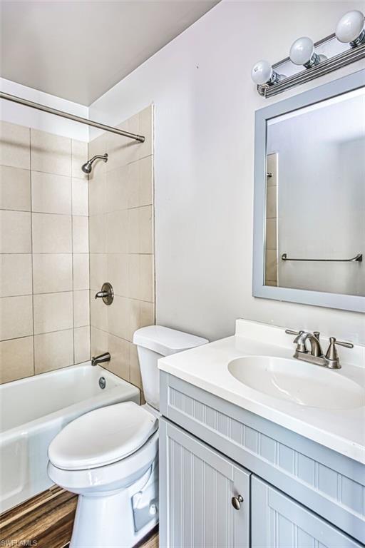Full bathroom featuring vanity and bathtub / shower combination