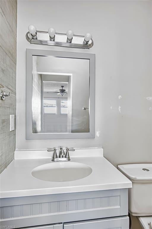 Bathroom with vanity and toilet