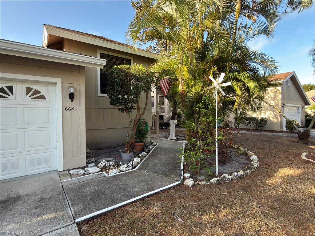Property entrance featuring a garage