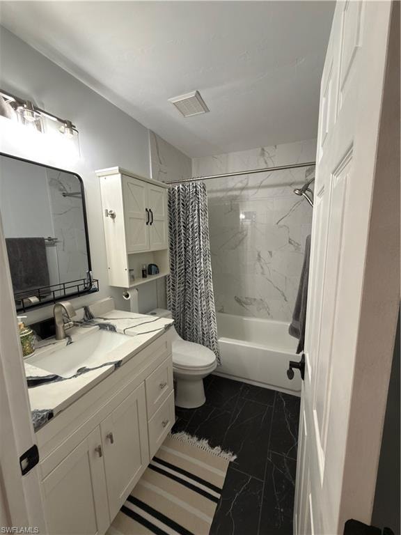 Full bath with vanity, shower / tub combo, and dark marble finish floors