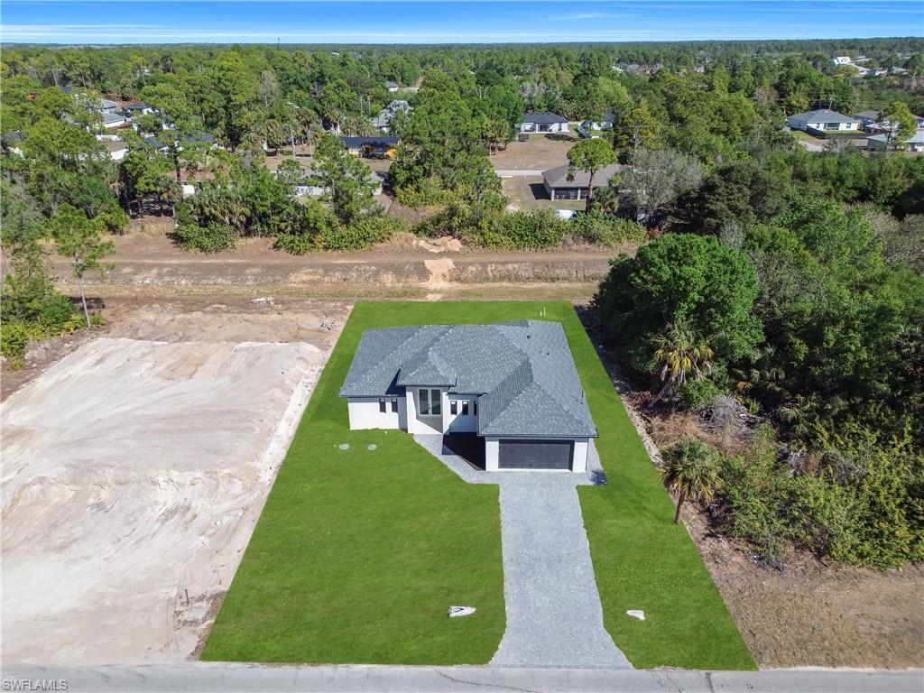 Aerial view of property and surrounding area