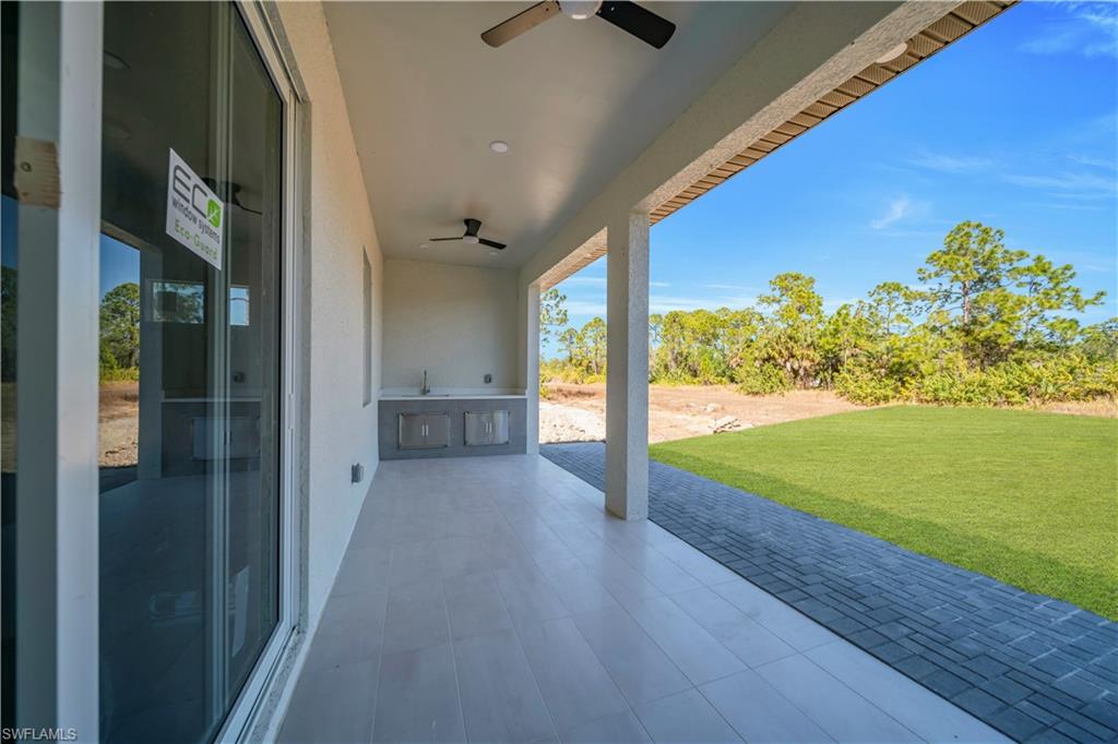 View of patio / terrace featuring ceiling fan