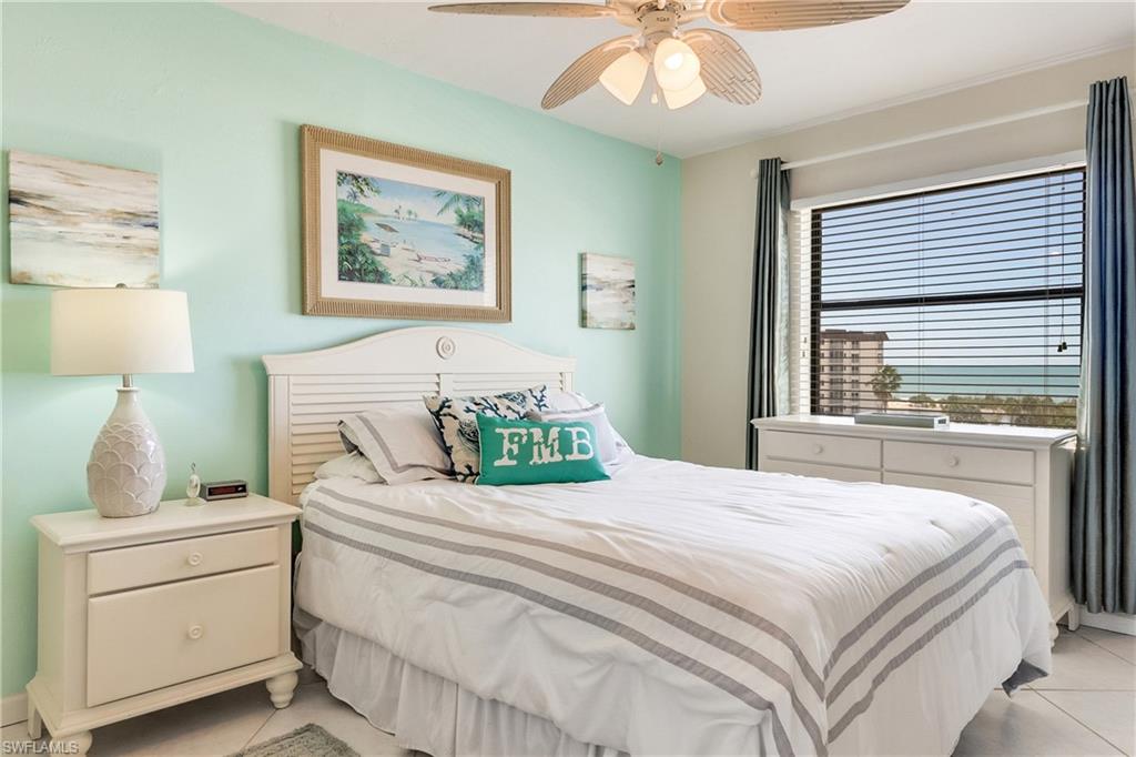 Bedroom featuring a ceiling fan and light tile patterned floors