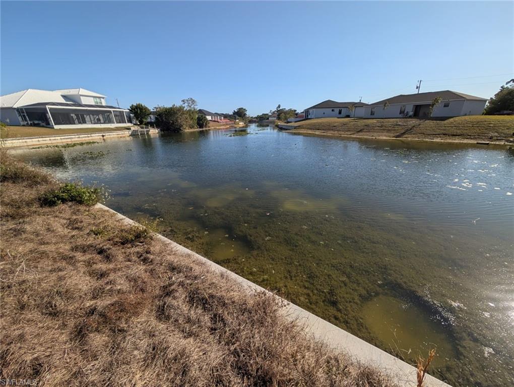 Water view featuring nearby suburban area