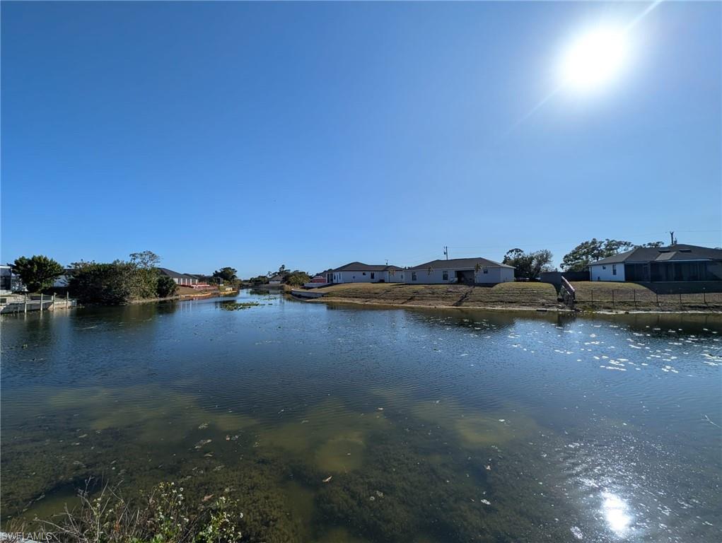 Water view with nearby suburban area
