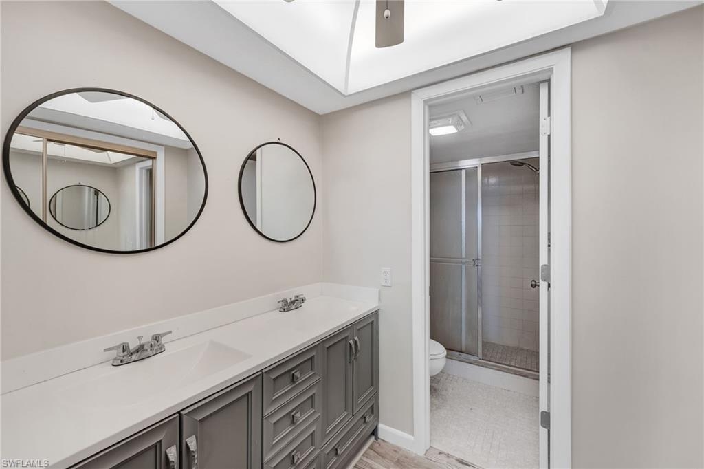 A well-appointed primary bath adds comfort and convenience to the home’s thoughtful layout.