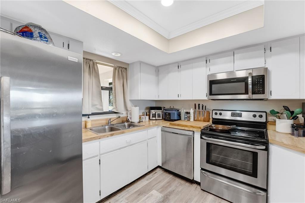 The kitchen combines functionality and style with stainless steel appliances and an easy, open layout.