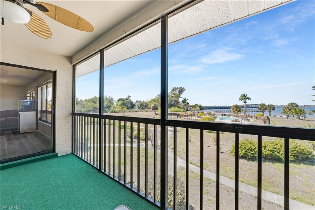 The screened-in patio is the perfect place to relax and take in the river views.