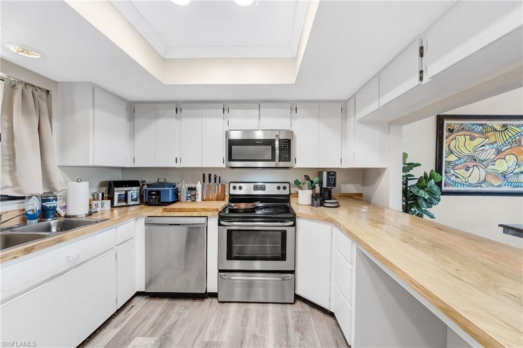 Designed for both everyday living and entertaining, the kitchen offers convenience and modern appeal.