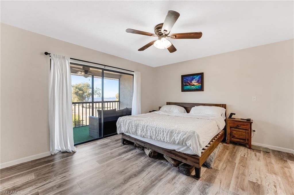 The primary bedroom offers a comfortable retreat with peaceful views and natural light.
