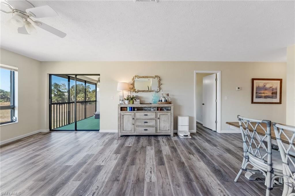 Filled with natural light, the open living space feels airy, comfortable, and inviting.