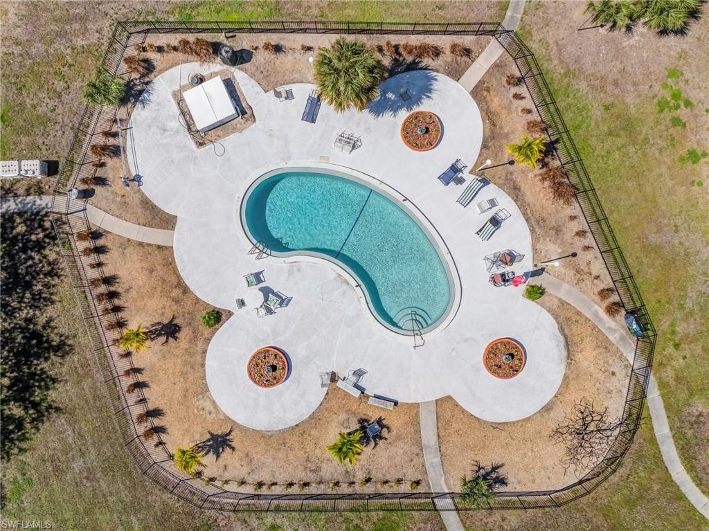 Residents enjoy access to a community pool, perfect for relaxing and soaking up the Florida sunshine.