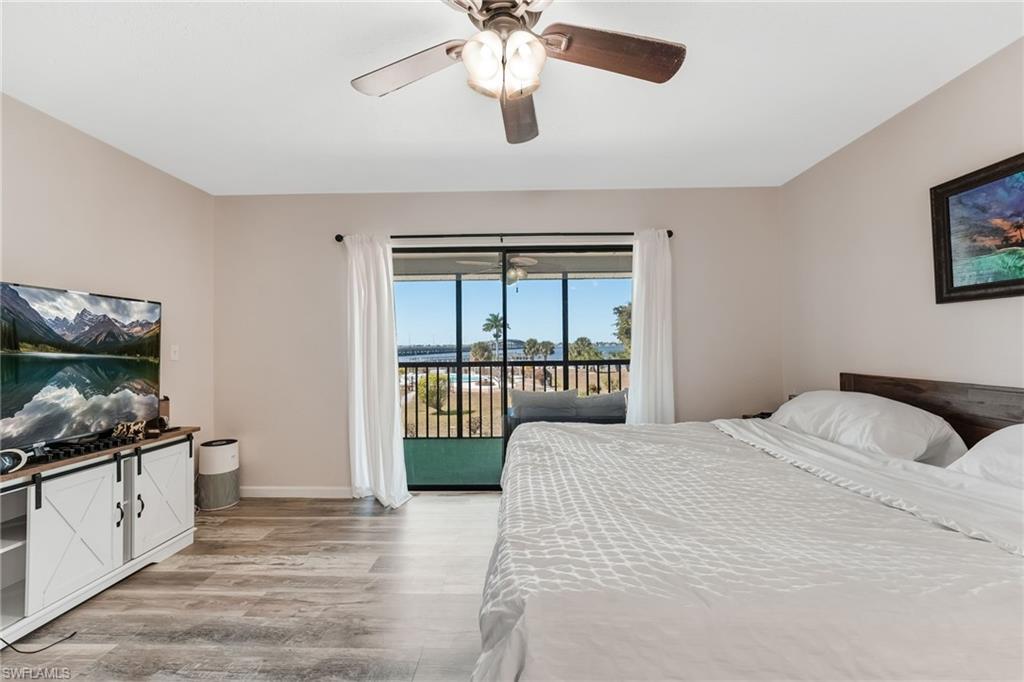A serene primary suite designed for easy waterfront living.