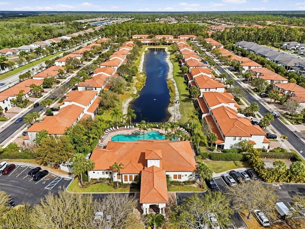 Aerial overview of property's location featuring nearby suburban area and a nearby body of water
