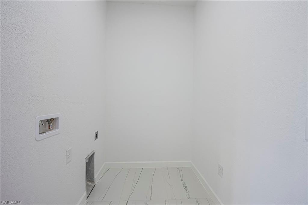 Laundry area featuring washer hookup and hookup for an electric dryer