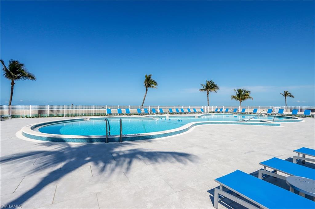 Community pool featuring a patio area