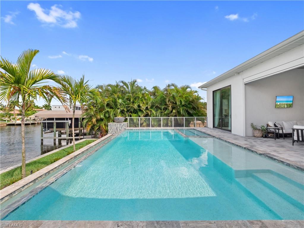 Outdoor pool with a patio area