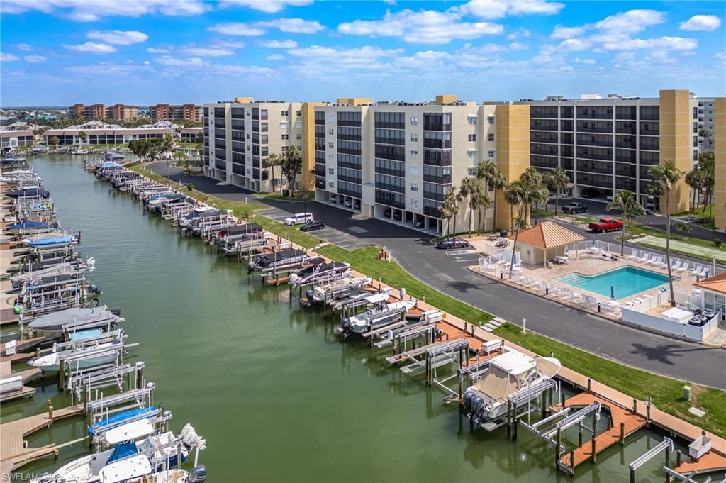 Bird's eye view of a large body of water and apartment complex