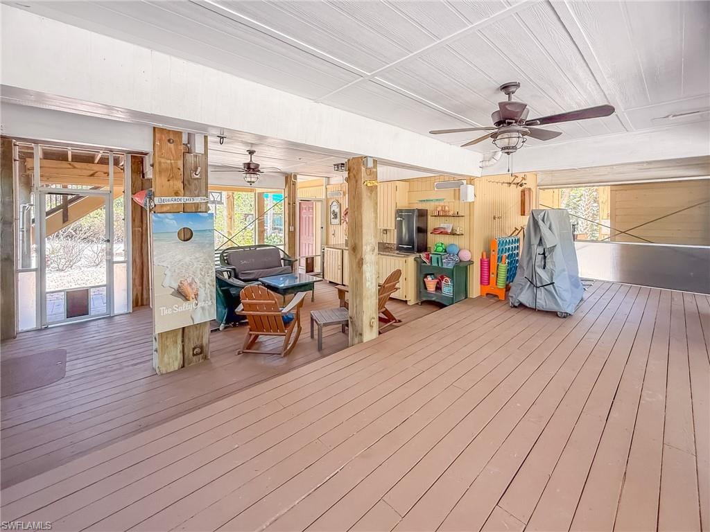 View of swimming pool with a deck and a fenced in pool
