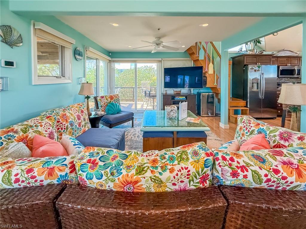 Bedroom with lofted ceiling and access to exterior