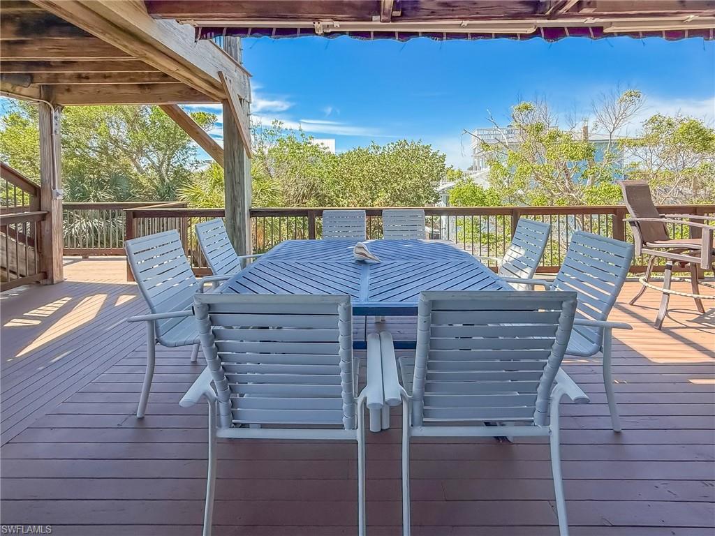 Wooden deck featuring an outdoor hangout area