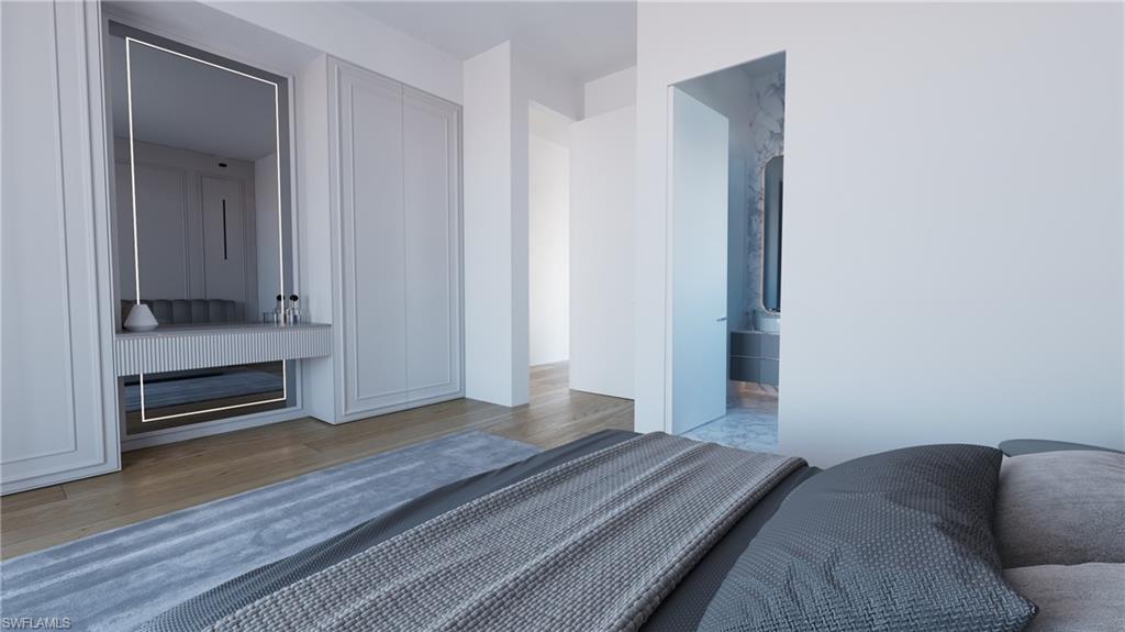 Rendering-Bedroom featuring light wood-style flooring and ensuite bath