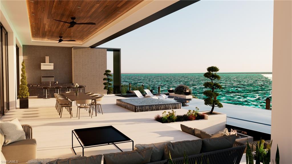 Rendering-View of patio featuring exterior kitchen, ceiling fans, a water view, and an outdoor living / dining area, pool and spa