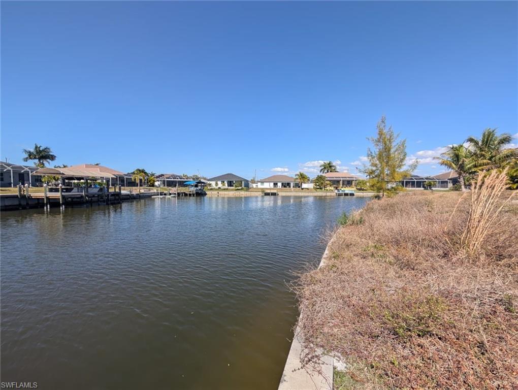 Water view with nearby suburban area