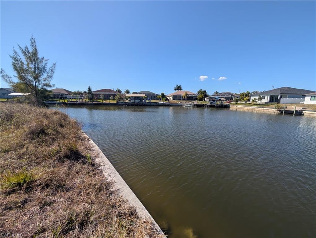 Water view with nearby suburban area