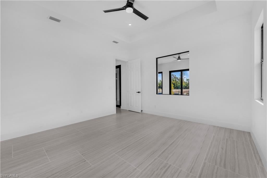 Unfurnished master  bedroom with ceiling fan and recessed lighting