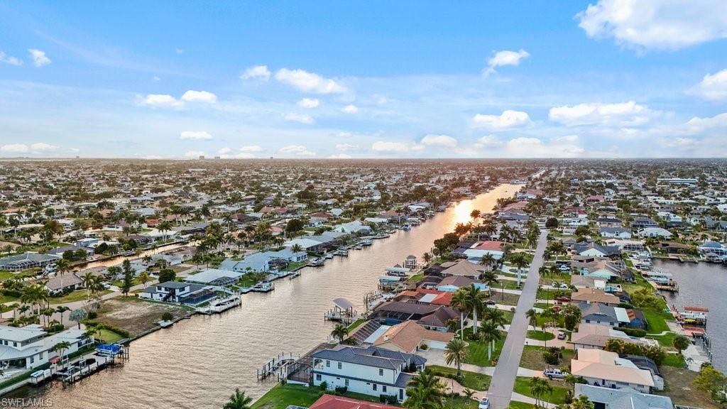 Aerial view of residential area with a large body of water