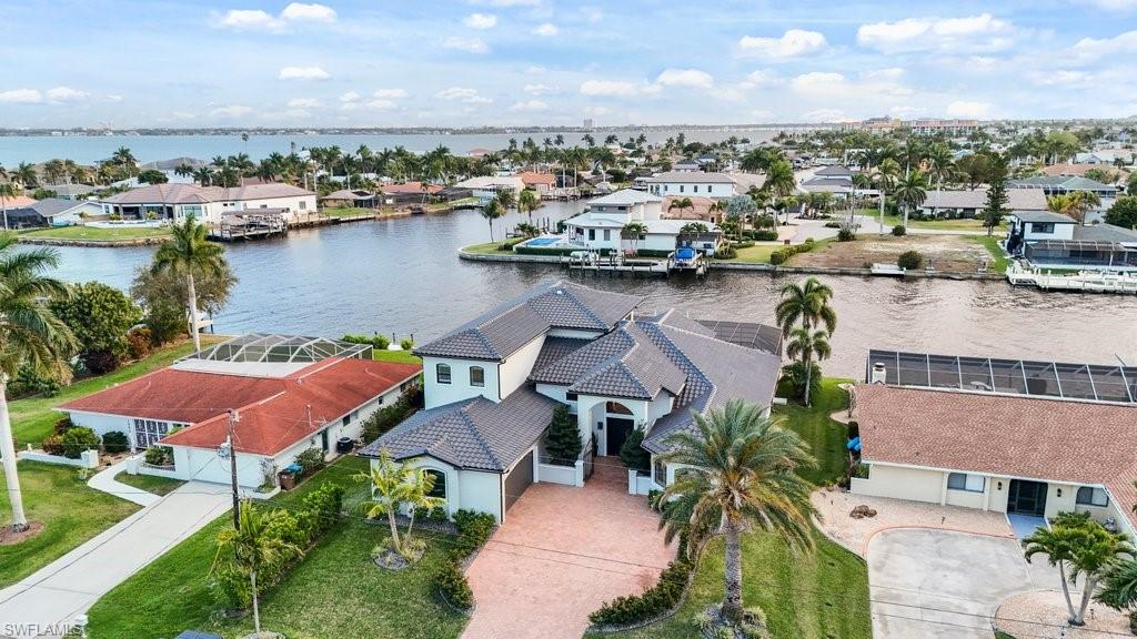 Aerial view of residential area with a large body of water