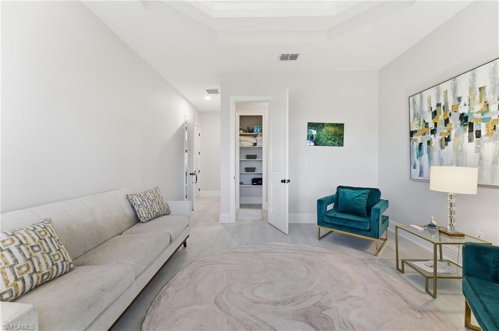 Living room with a tray ceiling