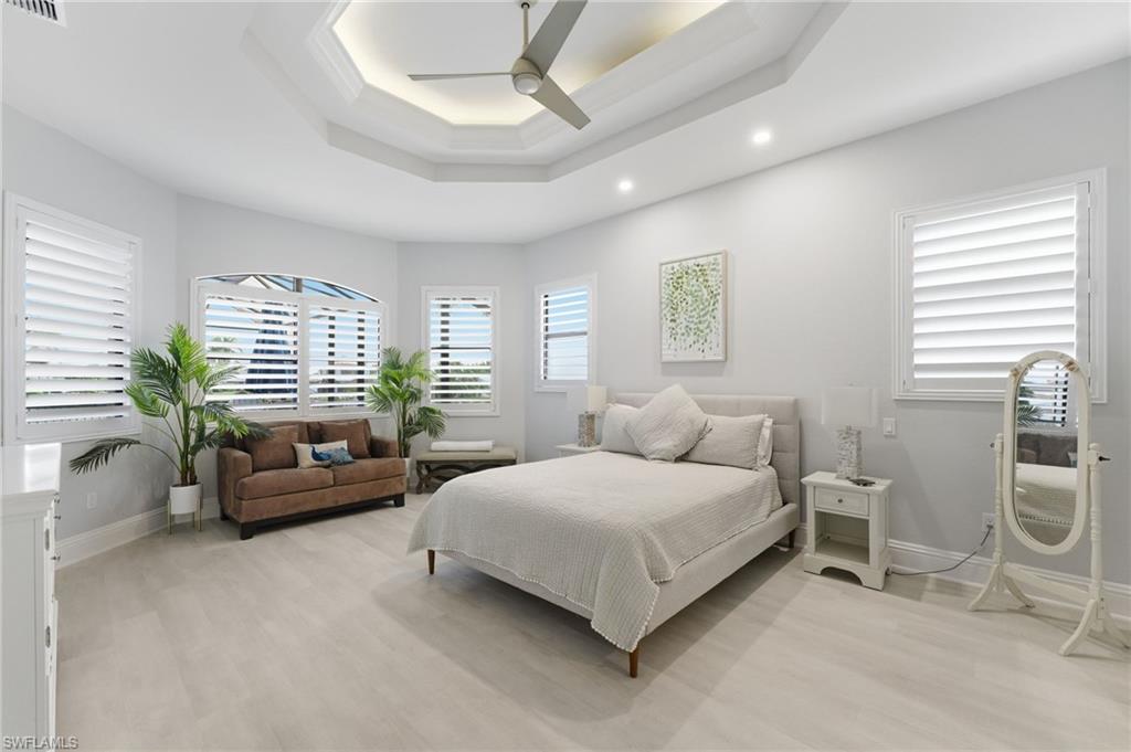 Bedroom featuring light wood-style floors and a ceiling fan