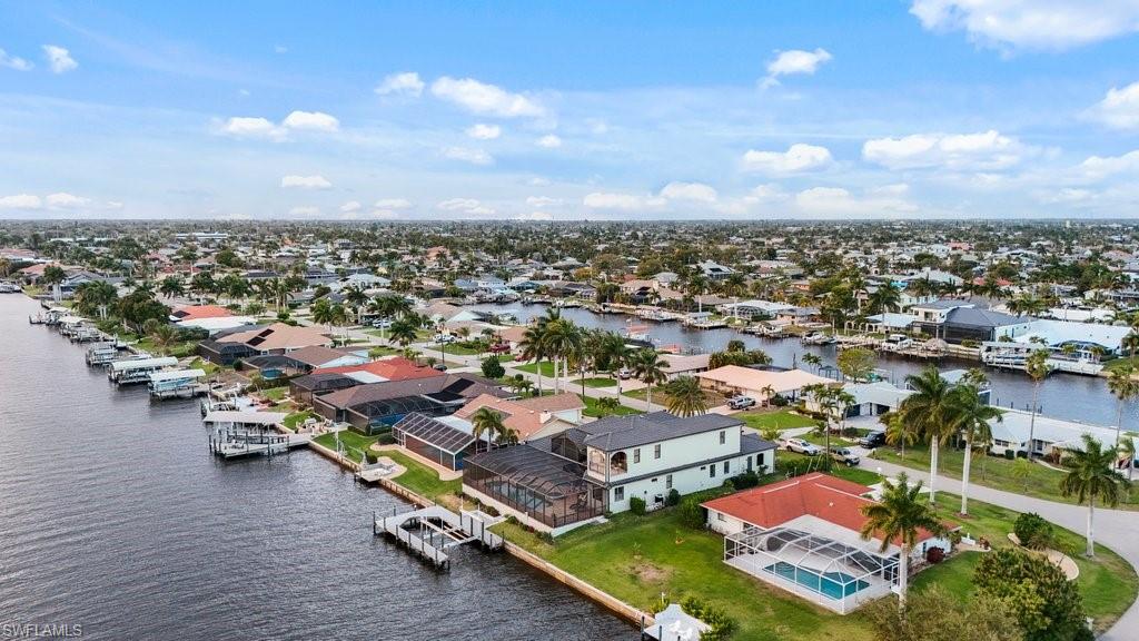 Aerial view of residential area with a nearby body of water