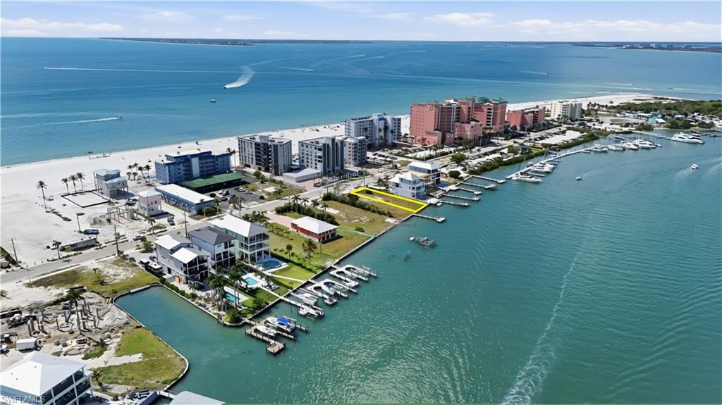 Aerial view of a nearby body of water and numerous boat docks - Virtually Edited Image